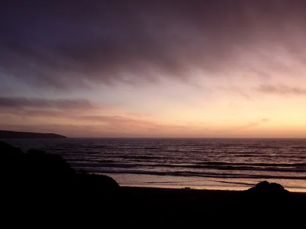 fog coming in at sunset